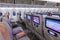 DUBAI, EMIRATES - MARCH 14, 2016: Boeing 777 EMIRATES Economy class with TV Touch screen in Emirates Airlines in Dubai Airport