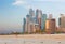 Dubai - The evening Marina towers from beach