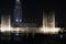 Dubai fountains show at night. Tourist attraction dancing fountain at Dubai Mall., UAE