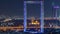 Dubai Frame with Zabeel Masjid mosque illuminated at night timelapse.