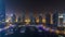 Dubai Marina all night timelapse, Glittering lights and tallest skyscrapers during a clear evening