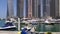 Dubai marina day light private yacht port panoramic view 4k uae