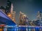 Dubai Marina, harbour, cruise boat and canal promenade view at night, in Dubai, United Arab Emirates