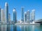 Dubai Marina and lake or river, Downtown skyline, United Arab Emirates or UAE. Financial district and business area in smart urban