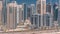 Dubai Marina skyline with Mohammad Bin Ahmed Al Mulla mosque aerial timelapse
