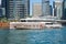 Dubai Marina Yacht Club with futuristic massive Lotus yacht transport boat in the harbor