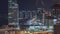 Dubai media city skyscrapers and construction site on palm jumeirah night timelapse, Dubai, United Arab Emirates