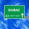 DUBAI road sign against clear blue sky