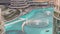 Dubai singing fountains with walking area around aerial view timelapse.