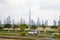 Dubai skyline and Burj Khalifa skyscraper, cars passing in the morning