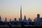 Dubai skyline with Burj Khalifa skyscraper at sunset, clear sky