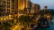 Dubai. In the summer of 2016. A water oasis in the evening on the territory of Madinat Jumeirah Mina a Salam