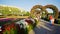 Dubai, UAE - December 14, 2019: Heart shaped flower beds at the Alley of Hearts. Dubai Miracle Garden is famous for its