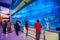 DUBAI, UAE - DECEMBER 4, 2016: Dubai Mall with famous Aquarium and tourists