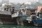 Dubai UAE Dhows old wooden sailing vessels are docked along the Deira side of Dubai Creek.