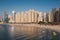 Dubai, UAE - February 15, 2020: Marina JBR Beach Sea water font tall buildings