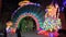 Dubai, UAE - January 13, 2018: Arch entrance into tunnel, looks like tail of peacock. Colorful world festival in Dubai