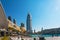 Dubai, UAE - January 2, 2018: Downtown Dubai skyline, view from the Dubai fountain. Modern city cityscape with skyscrapers, sidewa