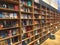 Dubai UAE - July 2019: Pile of colorful literature books. Various books title arrangement on shelves display in literature section