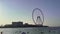 Dubai, UAE - June 26,2023: Jumeirah Beach in Dubai in front of the ferris wheel