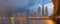 DUBAI, UAE - MARCH 24, 2017: The evening skyline with the bridge over the new Canal and Downtown with ths storm clouds