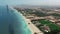 DUBAI, UAE - MAY 09, 2018: Aerial view of world most highly rated hotel Burj Al Arab. Stock. Burj Al Arab in Dubai, UAE