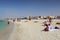 DUBAI, UAE - NOVEMBER 23, 2017: People visit the beach in Dubai, United Arab Emirates. Dubai is a perfect beach destination. The