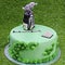 Dubai, United Arab Emirates - August 24, 2020 Designed birthday cake on a green grass background, Golf theme
