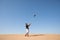 Dubai, United Arab Emirates - Dec 2, 2016. A falcon during a falconry training in the desert catching a lure.