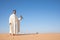 Dubai, United Arab Emirates - Dec 2, 2016. A falcon during a falconry training in the desert catching a lure.