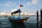 DUBAI, UNITED ARAB EMIRATES - DECEMBER 7, 2016: View of Dubai Creek with traditional water taxi boats. Gulf of Dubai, UAE