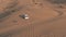 DUBAI, UNITED ARAB EMIRATES - JANUARY 4, 2020. Aerial tracking shot of a Toyota Sequoia full-sized SUV driving along