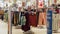 Dubai, United Arab Emirates - july 14, 2022 textile show room with lot of collection of men\\\'s ladies and kids garments