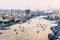 Dubai, United Arab Emirates - June 4, 2019: Boats on Dubai creek in Deira with the view of old Dubai in United Arab Emirates