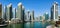 Dubai, United Arab Emirates - March 8, 2018: Dubai marina panoramic day time view with modern skyscrapers and calm water