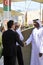 DUBAI, UNITED ARAB EMIRATES, UAE - JUNE 20, 2019: An Arab man and a western man shake hands as a sign of peace. the concept of