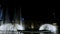 DUBAI, UNITED ARAB EMIRATES, UAE - NOVEMBER 20, 2017: Night Dancing fountains, in foreground, boat with tourists is