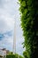 Dublin city center, Ireland - 07.06.2021: The Spiro monument on O`Connell street, Vertical image. Cloudy sky