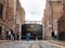 Dublin, Ireland - 07.12.2023: Tourist taking pictures by famous Guinness store house brewery gate. Popular city landmark. Famous