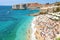 DUBROVNIK, CROATIA - JULY 12, 2019: Aerial view of Dubrovnik old town and Banje beach, Adriatic sea