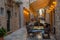 Dubrovnik, Croatia, July 26, 2020: Nightlife at a narrow street