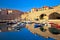 Dubrovnik harbor and city walls morning view with calm sea