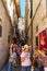 Dubrovnik Old Town, Croatia, June 30, 2023 - crowds of tourists travel through the historic city streets, medieval European