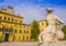 Ducal garden`s palace with marble statue in foreground, Parma, Italy