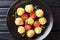 Duchess potatoes served with mint and tomatoes closeup on a plat