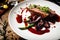 Duck breast served on a plate in restaurant