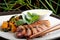Duck breasts with sour mango sauce and pan-seared sweet potatoes