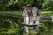 Duck house on a pond