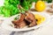 Duck legs confit with orange and salad
