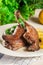 Duck legs confit with orange and salad